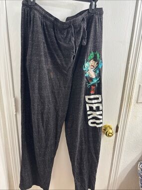 Black 'Deku' Graphic Lounge Pants for Men there is a light Clorox stain